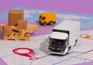 Mappa geografica con furgone e scatoloni per trasloco 